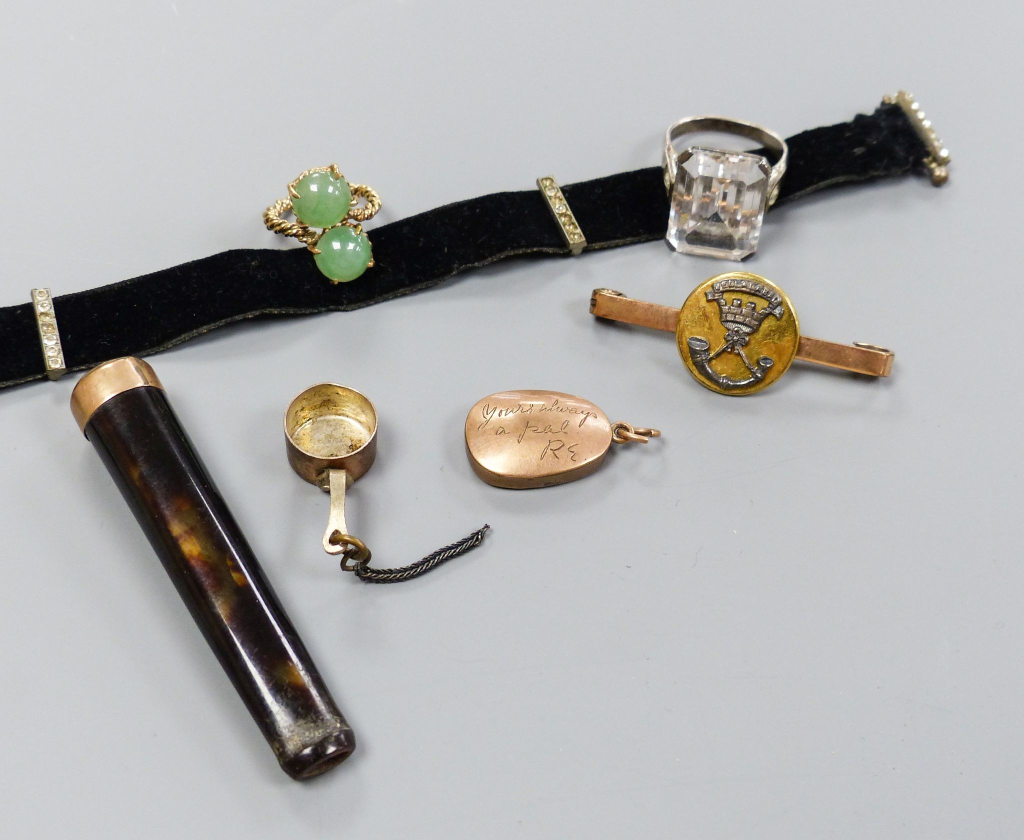 Minor jewellery including a white metal and white paste set dress ring, one other two stone ring, a bar brooch etc.